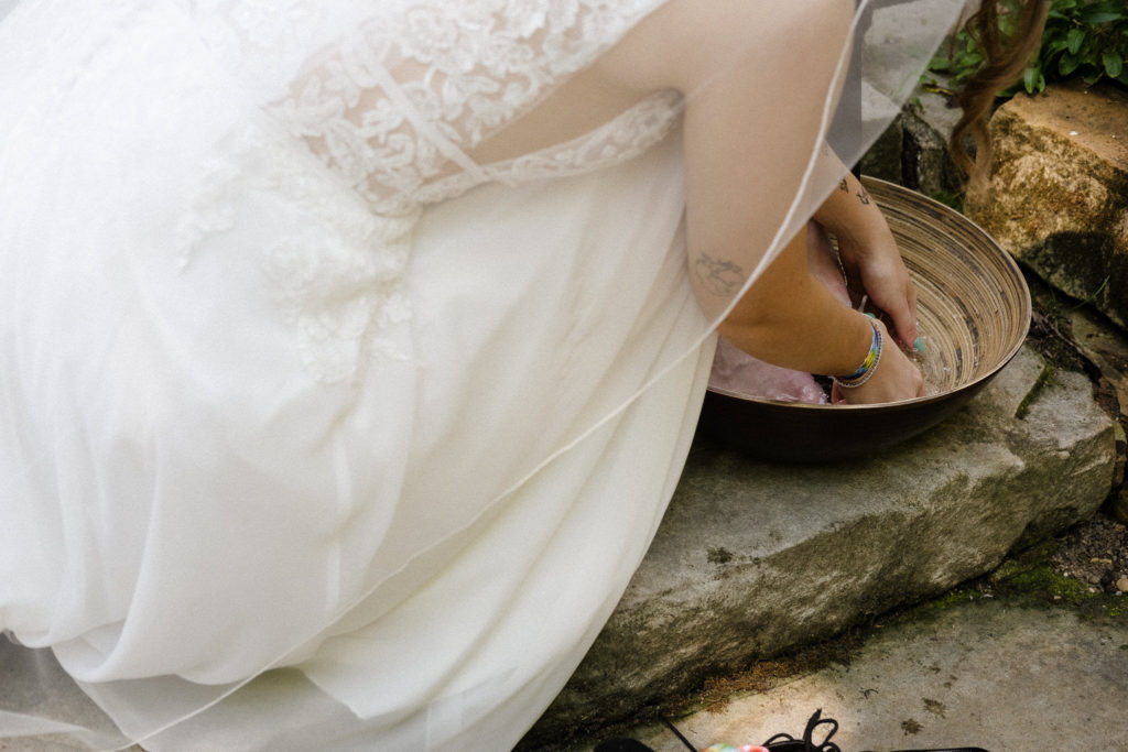 An intimate foot washing ceremony at The Lantern Court Estate at Holden Arboretum in Cleveland Ohio.