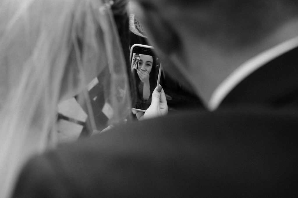 The newlyweds FaceTiming with friends from Spain after the wedding ceremony in Cleveland Ohio.
