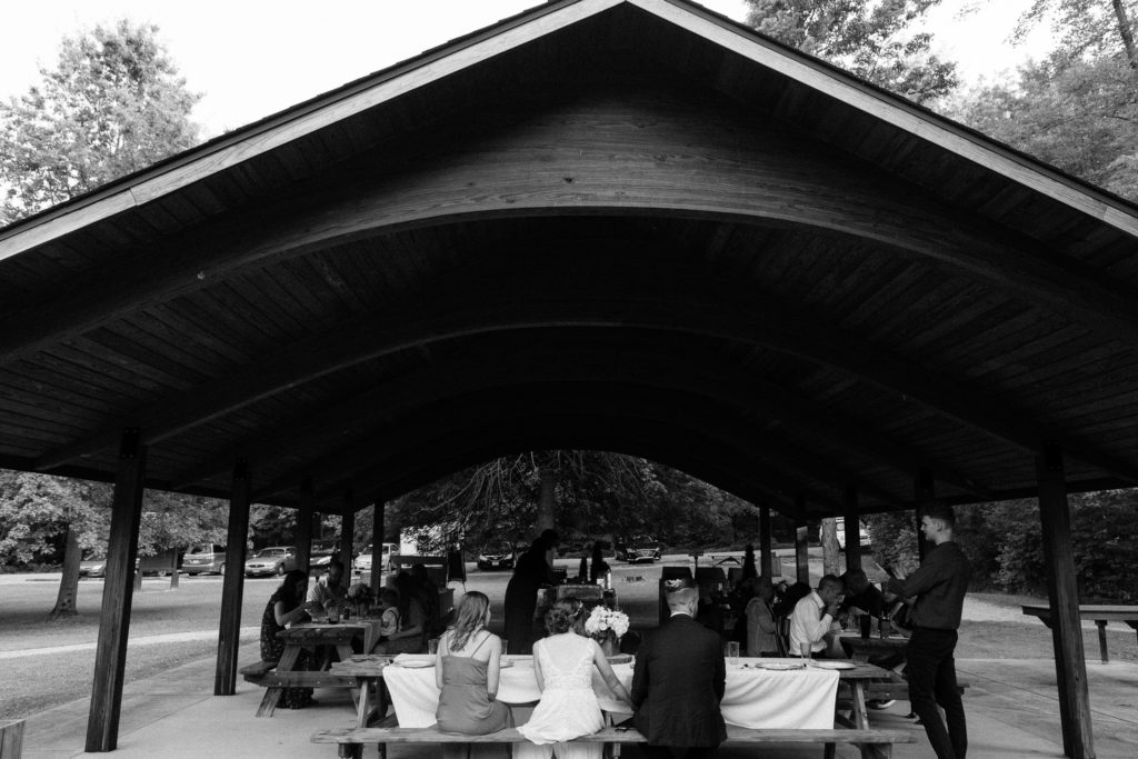 Wedding reception details and candids at a park in Cleveland Ohio. Best man giving a speech.