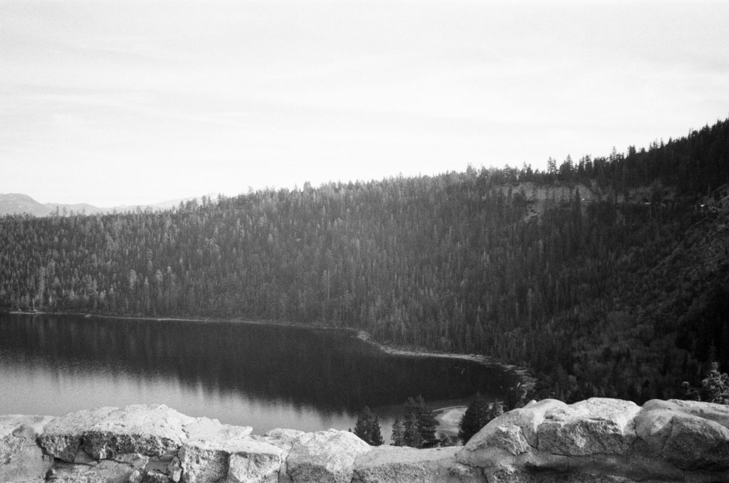 Black and white landscape photo of Emerald Bay State Park by Lake Tahoe.