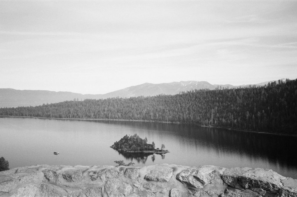 Black and white landscape photo over looking Lake Tahoe at Emerald Bay State Park.
