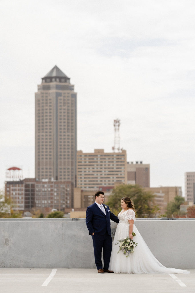 Take your timeless wedding portraits in front of the iconic cityscape in downtown Des Moines IA.