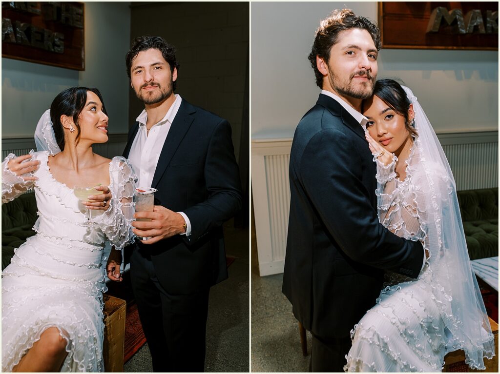 A bride sits at a bar and leans against a groom inside Diane's Place.